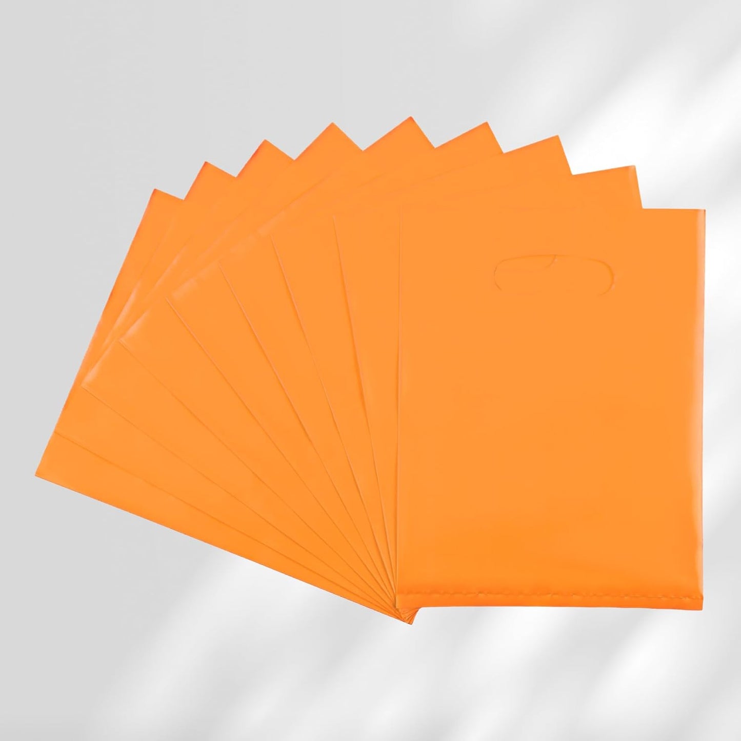 Orange 100 PCS Small Gift Bags, 6"x8" Goodie Party Favor Bags with Handle, Treat Retail Pouches for Kids Birthday, Christmas, Small Business