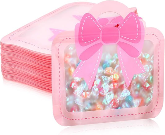 Gilprop 50 Pcs Coquette Bow Party Favors Bow Treat Bags with Handle Plastic Goodie Bags 7.48 x 7.48 Inch for Home Baby Shower Favors Class Party Decoration(Pink)