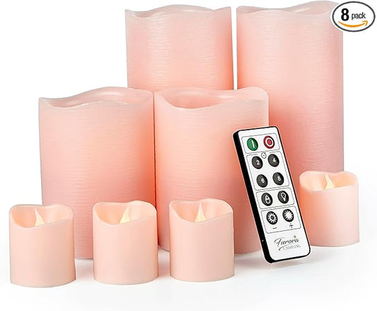 FURORA LIGHTING Pink Flameless Candles, 8-Pack Set with Remote & Timer | Includes 4 pillars and 4 votives. Creates a soft, romantic pastel pink glow perfect for weddings and bedroom aesthetics.