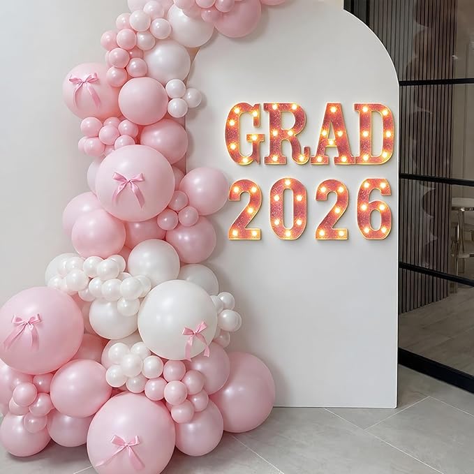 Honoson 8 Pcs Pink GRAD 2026 Sign Grad 2026 LED Sign Light up Graduation Party Decorations, Glitter Pink Light up Numbers Letters, Class of 2026 Decoration for Table High School Senior College Party