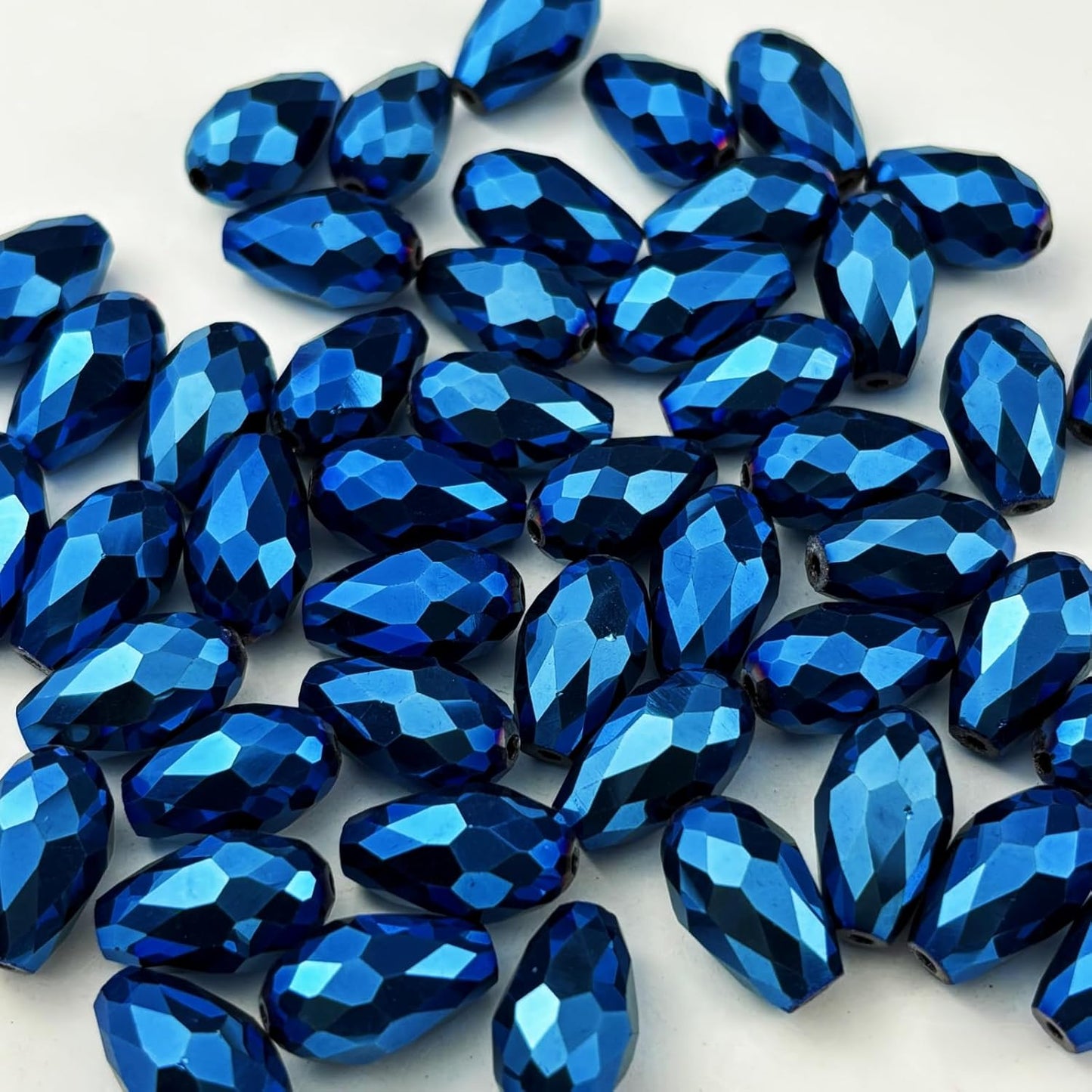 100pcs 8x12mm Teardrop Crystal Glass Beads for Jewelry Making, Faceted Vertical Hole Teardrop Glass Spacer Beads for Wind Chimes Bracelet Earring Necklace DIY Craft(Blue Light)