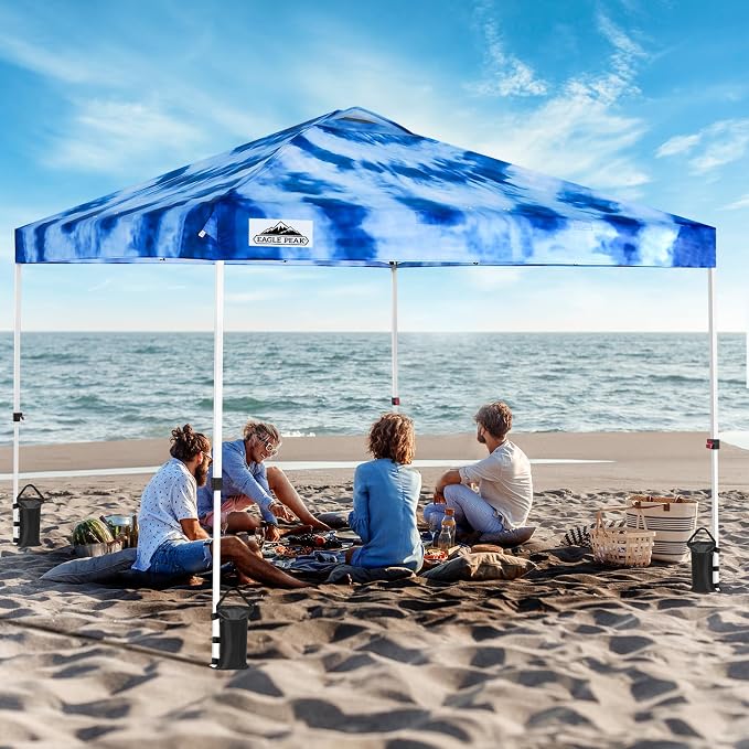 EAGLE PEAK Pop Up Canopy Tent with Wheeled Carry Bag, 8 Stakes, 4 Ropes, 4 Weight Bags, Easy Set Up Tent Canopy, 10x10 ft, 100sqft of Shade, Tie Dye Blue