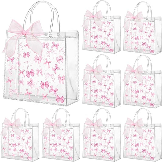 Wesnoy 24 Pcs Pink Bow Clear PVC Gift Bags with Handle and Ribbon Coquette Bowknot Reusable Plastic Party Favor Candy Treat Tote Bags for Birthday Party Supplies
