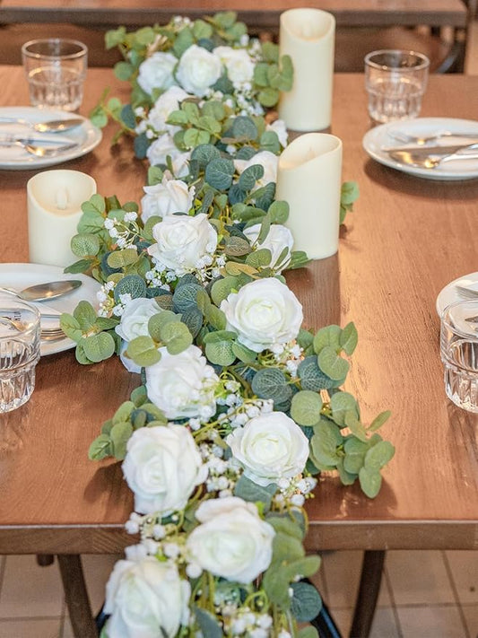 6FT Artificial Eucalyptus Garland with Flowers, 10 White Roses Baby Breath Garland Floral Greenery for Wedding Party Centerpiece Table Runner Backdrop Wall Decor Decoration