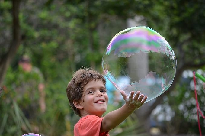 WOWMAZING Winter Edition Giant Bubbles: Incl. Wand, 7 Big Bubble Concentrate Pouches and 8 Glow-in-The-Dark Stickers | Outdoor Toy for Kids, Girls | Bubbles Made in The USA