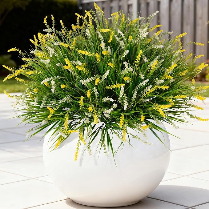 Ammyoo Artificial Faux Plants for Outdoor Spring Decoration, 12 Pcs Fake Monkey Grass for Garden Porch Balcony Planters, Fake Flowers Shrubs UV Resistant No Fade Plants Greenery Bush(Yellow White)